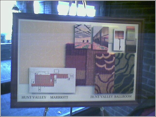 A sign showing samples of the carpets that would soon appear throughout the hotel